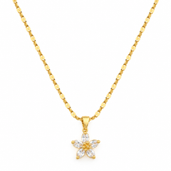 A gold chain necklace with a flower-shaped pendant featuring clear marquise-cut stones, displayed against a solid white background.