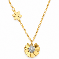 A gold daisy necklace featuring a main flower pendant with a clear crystal center, a smaller flower charm on the chain, and a matching gold chain against a white background.