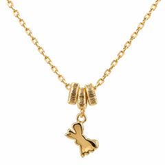 A gold chain necklace featuring three textured cylindrical beads and a dangling bunny-shaped charm, shown against a plain white background.