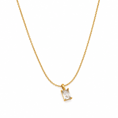 A delicate gold chain necklace with a small rectangular clear gemstone pendant in a gold bezel setting, shown against a plain white background.