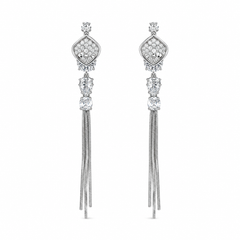A pair of silver-tone dangle earrings with pavé diamond-cut tops, clear crystal accents, and long snake-chain tassel drops, shown on a plain white background.