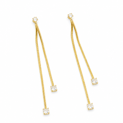 A pair of gold dangle earrings with textured snake-chain drops and square clear gemstones at the ends, shown on a plain white background.