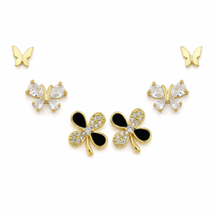 A set of butterfly stud earrings in gold-tone metal, featuring three pairs: two small gold butterfly studs, two medium gold butterfly studs with clear rhinestones, and two larger gold butterfly studs with black enamel inlays and clear rhinestones.