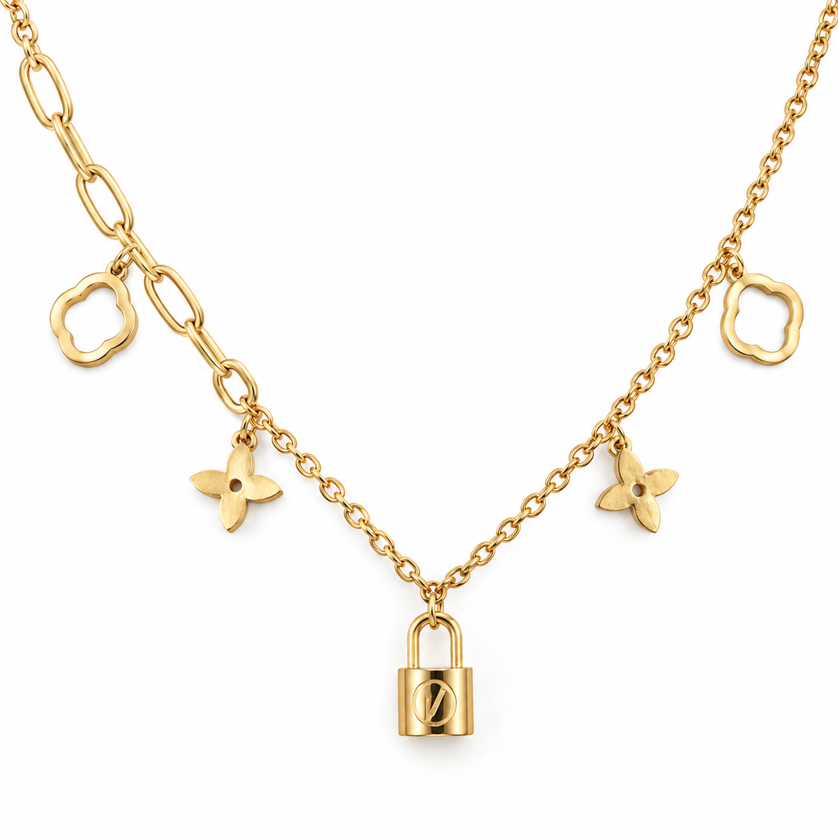 A gold-tone necklace featuring a fine chain with three distinct link styles, three clover-shaped charms, and a central padlock charm, displayed on a clean white background.