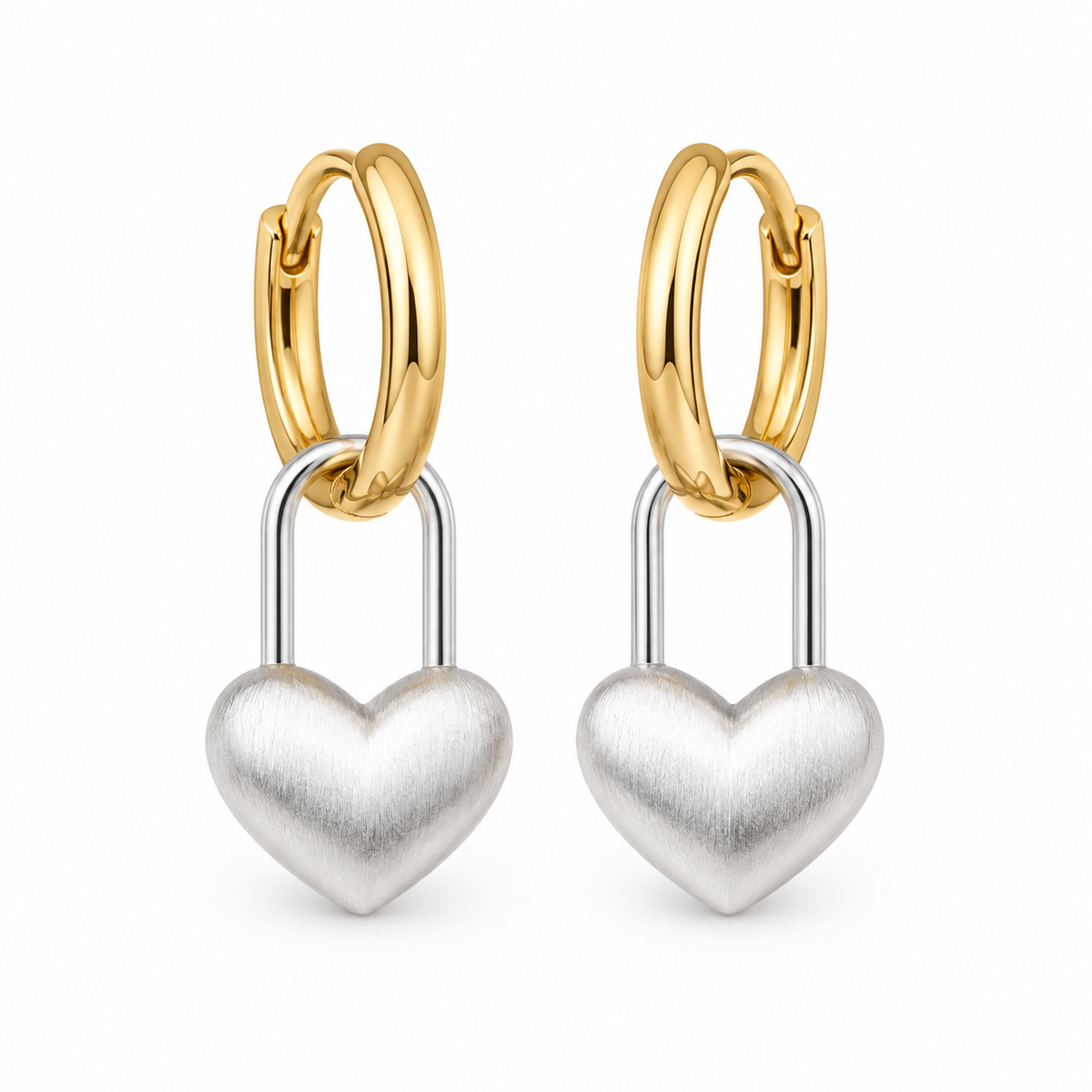 A pair of gold and silver hoop earrings with dangling heart-shaped padlock charms, shown on a clean white background.