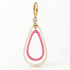 A gold-tone teardrop-shaped pendant earring featuring a translucent white outer ring, a pink inner ring, and a small clear crystal accent at the top.