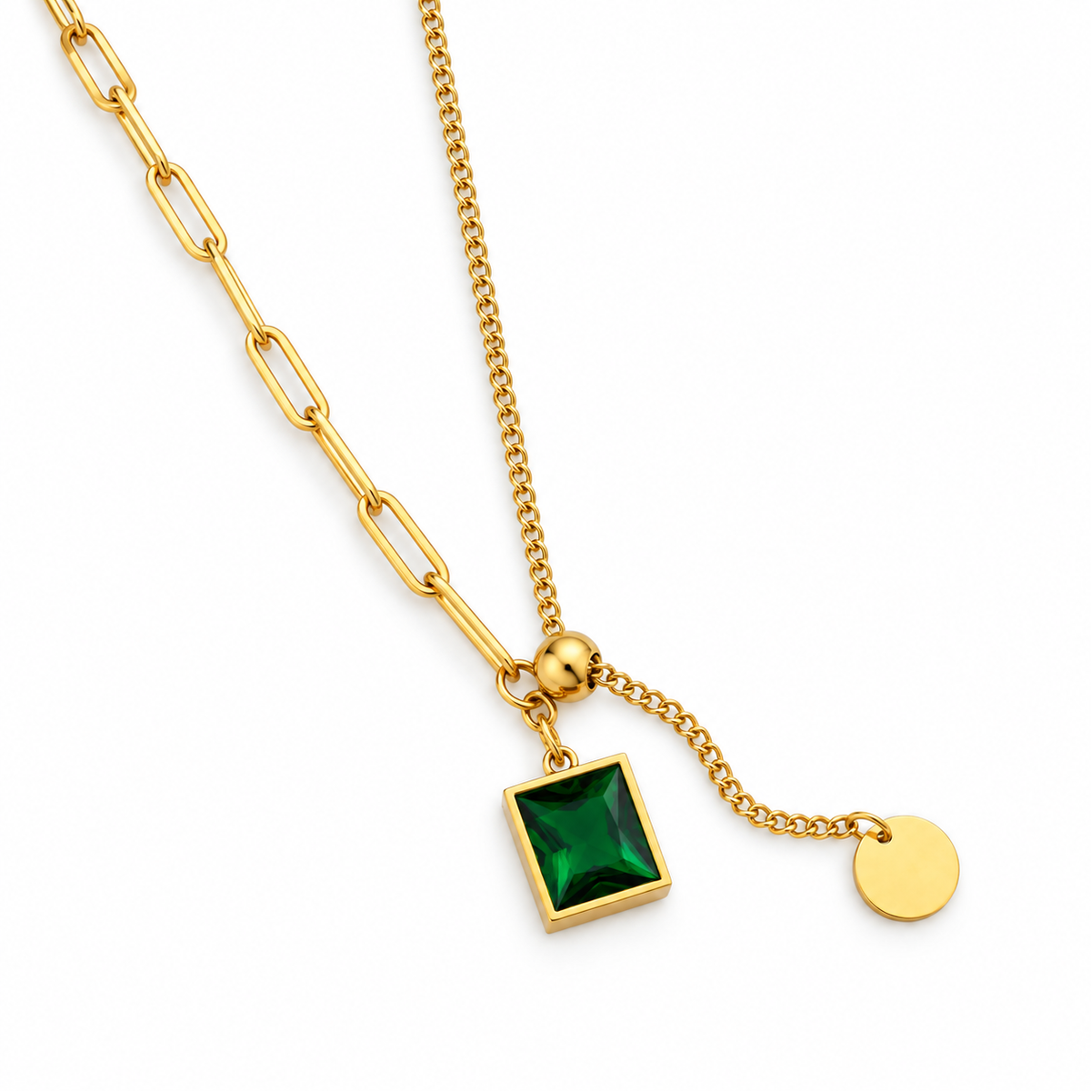 Gold chain necklace featuring a paperclip link section, a fine chain with a square green gemstone pendant, and a small round gold disc charm, shown on a white background.