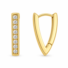 A pair of gold hoop earrings shown on a clean white background. One earring is oriented vertically and features a channel-set row of clear round gemstones.
